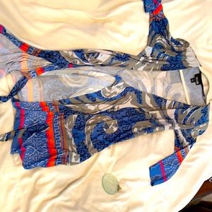 Adjustable wrap with three-quarter sleeves